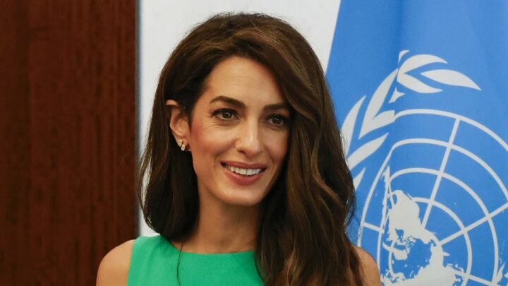 Amal Clooney glows in sleeveless green dress at United Nations meeting