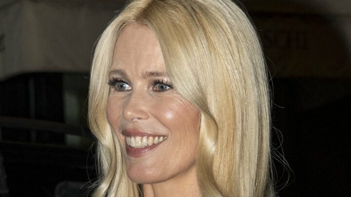 Claudia Schiffer stuns in blue Versace dress during Milan Fashion Week