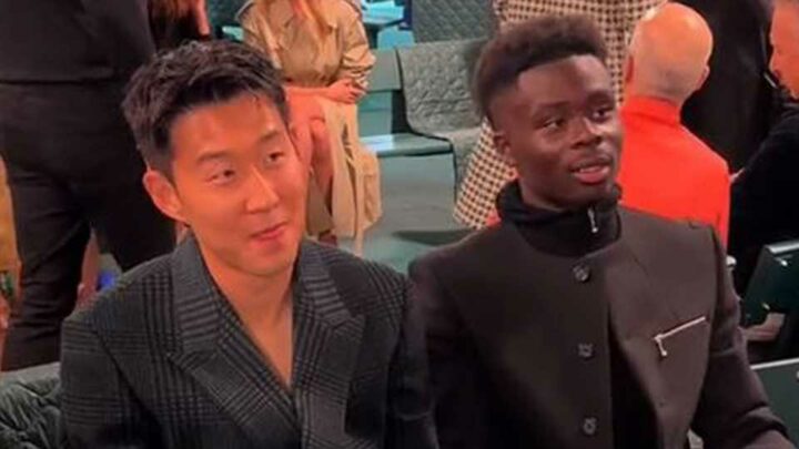 Saka and Son look awkward as they sit together at fashion show just days before North London derby with fans horrified | The Sun