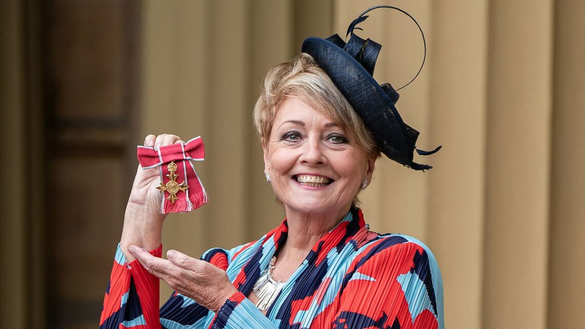 Anne Diamond looks delighted as she receives an OBE from King Charles