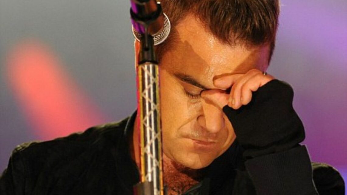 Robbie Williams felt ‘unsafe’ in Take That over ‘contract to kill’