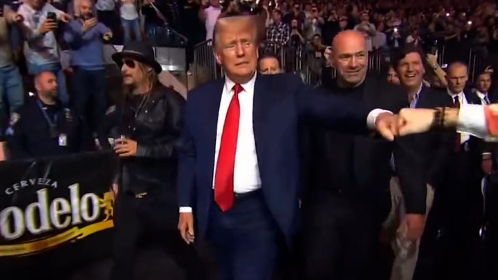 Donald Trump arrives at UFC 295 alongside Dana White and Kid Rock