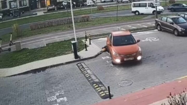 Moment mother in Belarus runs over her five-year-old son