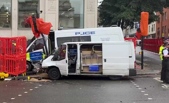 Pedestrian hurt after police car crashes with van in Farringdon | The Sun